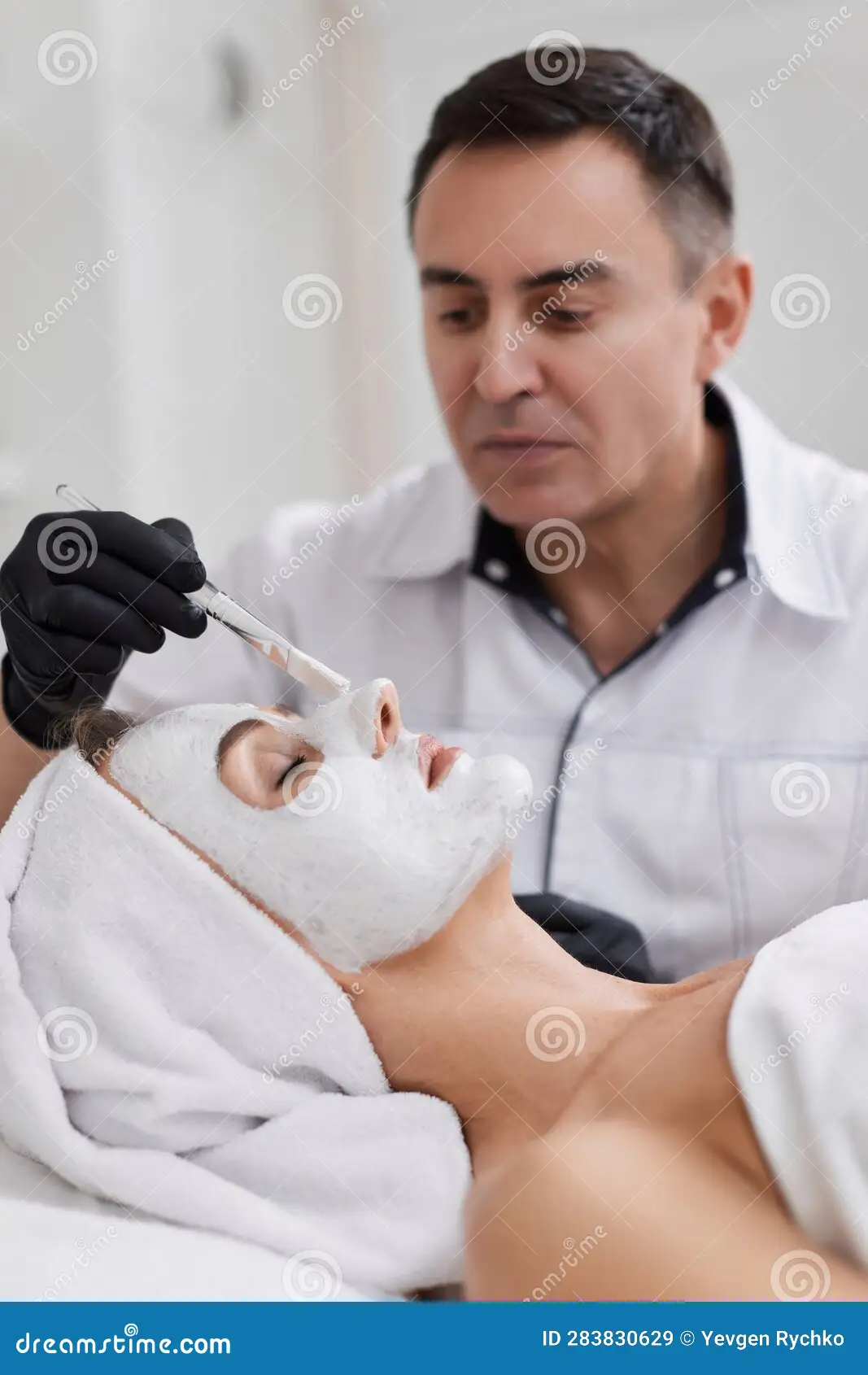 beautician-applies-mask-to-face-woman-spa-salon-skin-care-male-beautician-applies-mask-to-face-beautiful-283830629.webp
